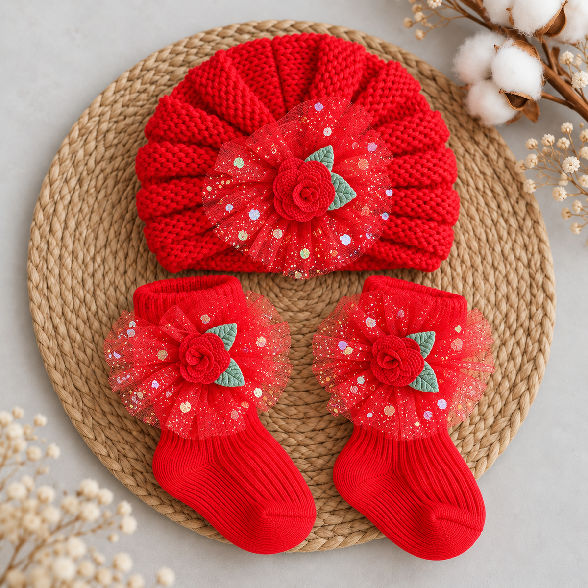 Red baby pleated turban cap and matching ribbed ankle socks, finished with red rose appliques and sparkling red dotted tulle floral trims.