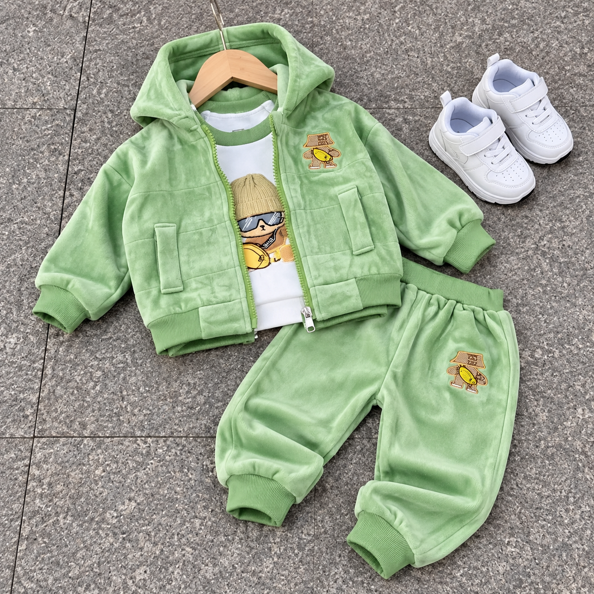 Light Green kids velvet jacket, shirt and trouser suit flat lay with zip-front hooded jacket and coordinated patch detail on the trouser.