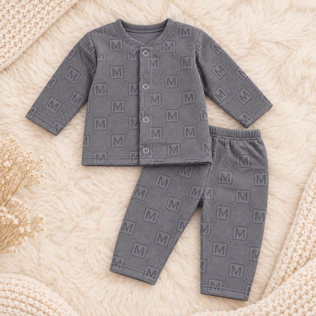 Flat lay of the grey 2-piece newborn letter knit set showing the long-sleeve snap-button shirt and elastic-waist trousers.