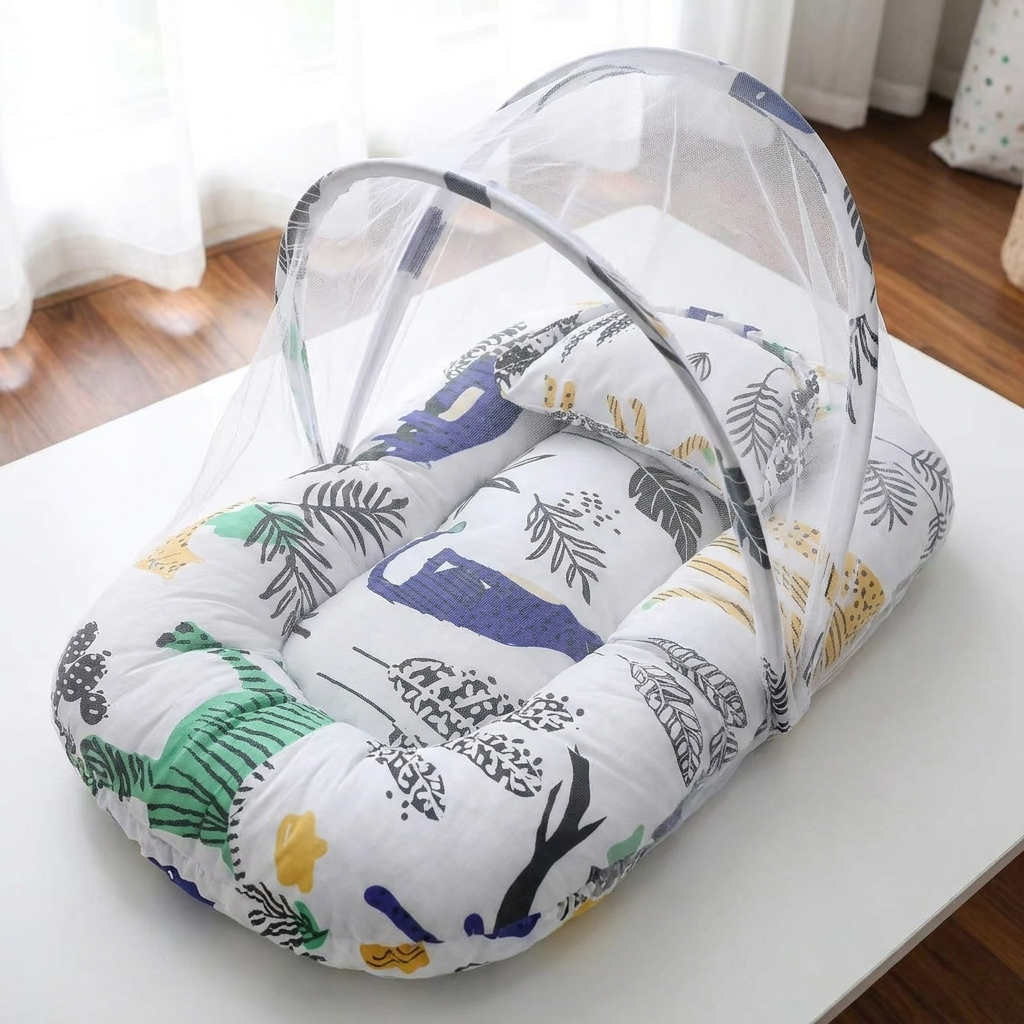 White baby mosquito carry nest with colourful safari animal print, matching pillow and raised grey-trim mesh canopy on a table